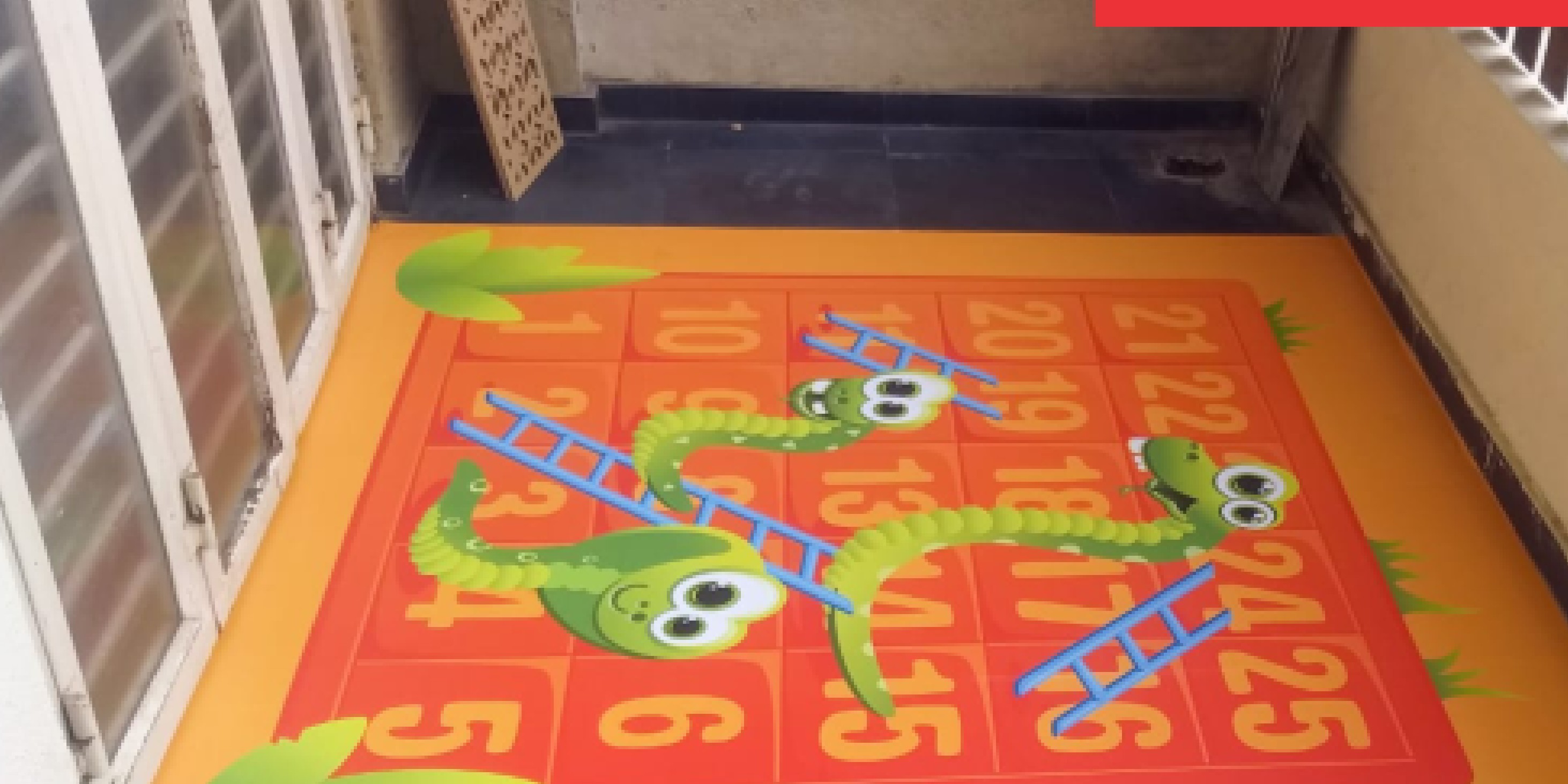 Floor and ceiling covering decals laid across a retail circulation area.