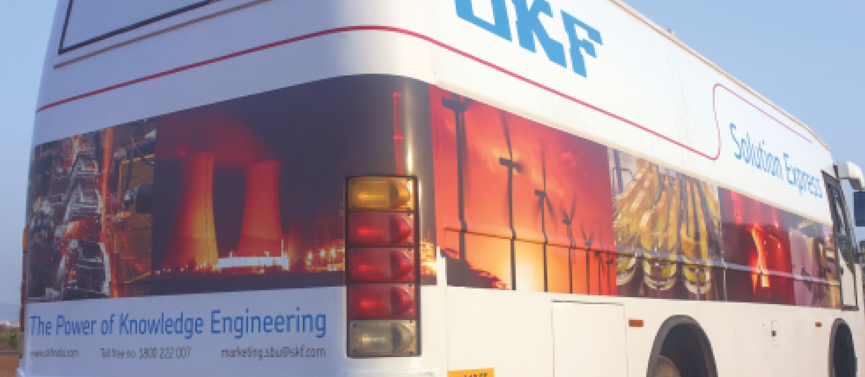 Staff coach fully wrapped in SKF corporate livery, printed and applied on site.