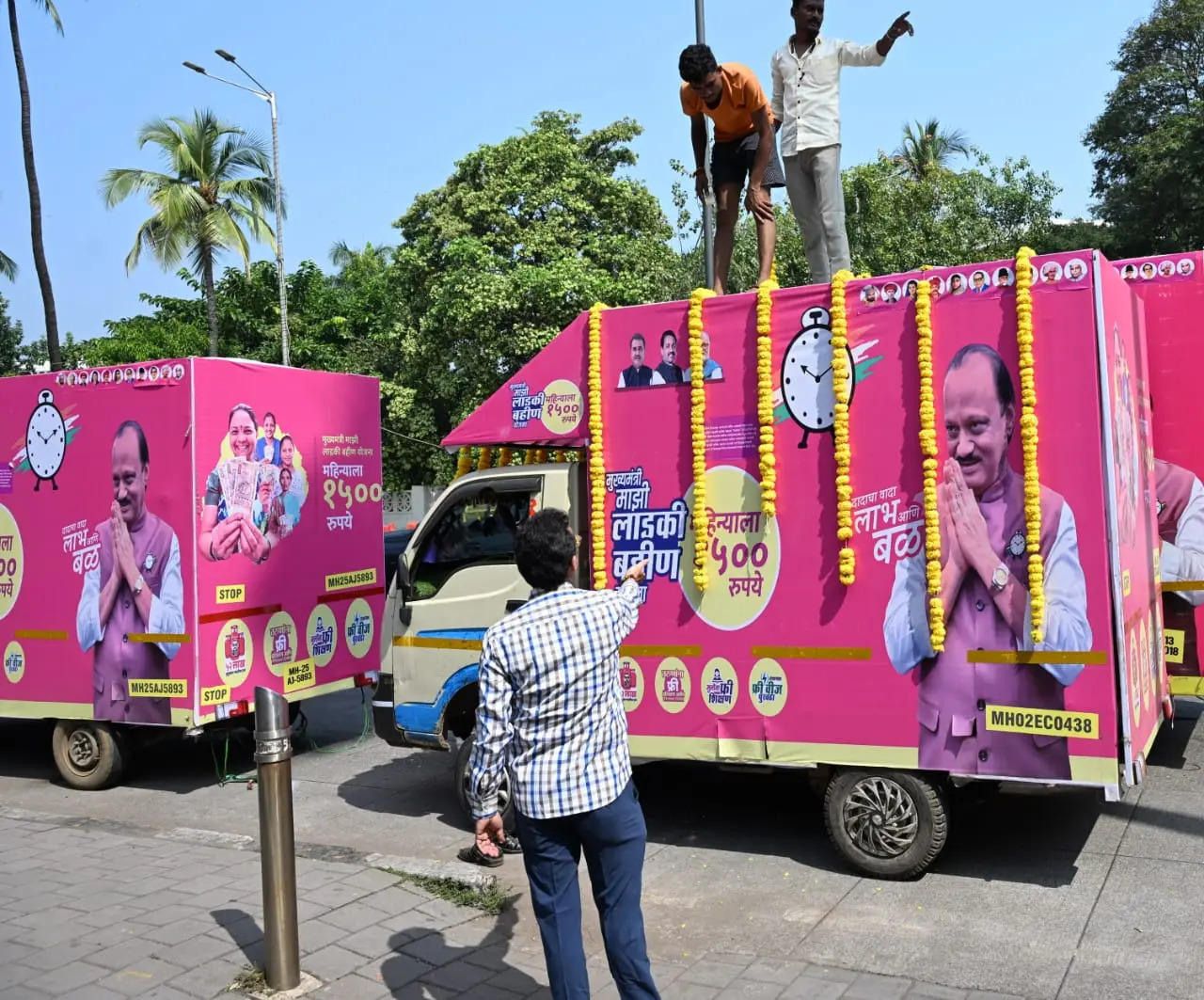 Government scheme awareness vehicle branded for a public outreach fleet.