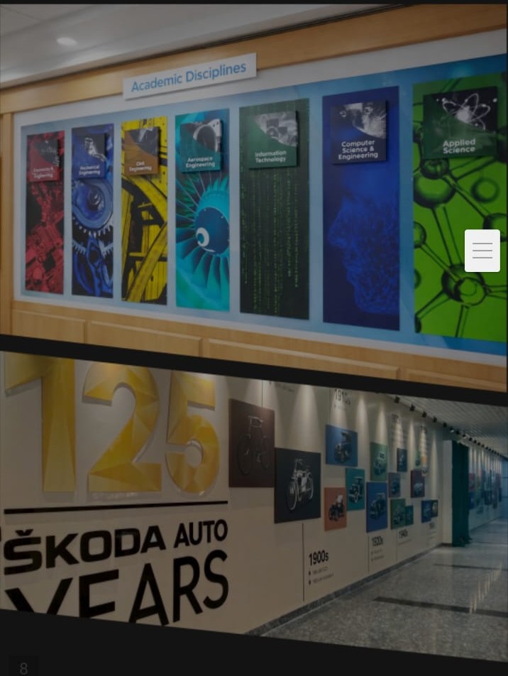 Large-format wall graphics applied across a heritage campus elevation.
