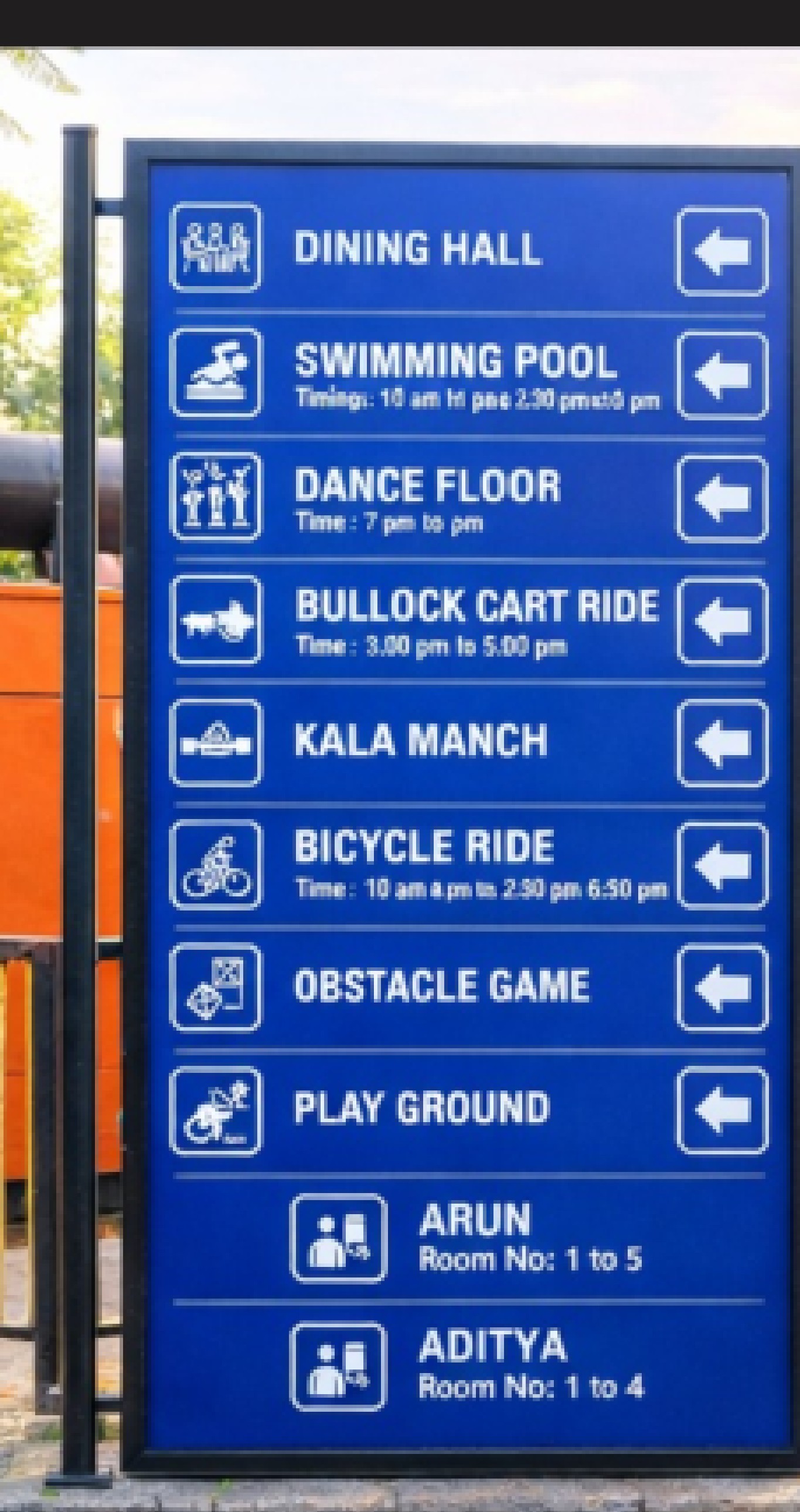 Campus and resort facility signage set installed across a landscaped property.